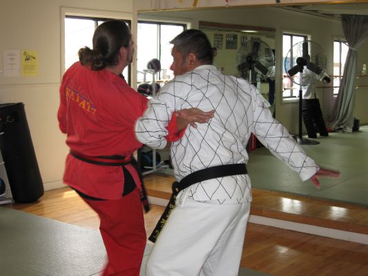 Inst. Sanchez applies technique on Sensei Reed